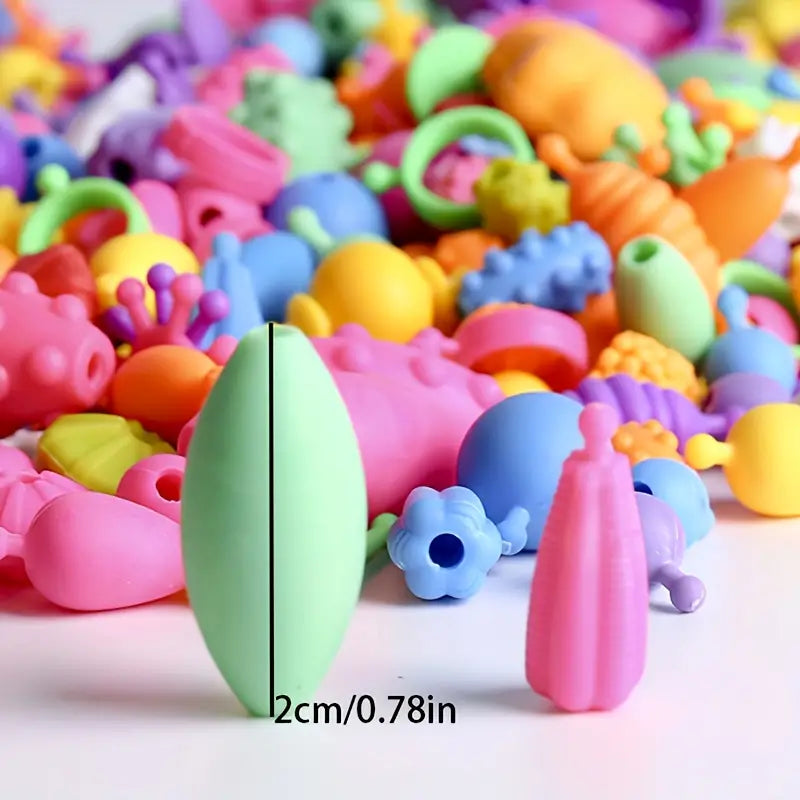 Juego de cuentas Pop para niños | Colorido kit de joyería DIY para juego creativo y desarrollo de habilidades motoras finas